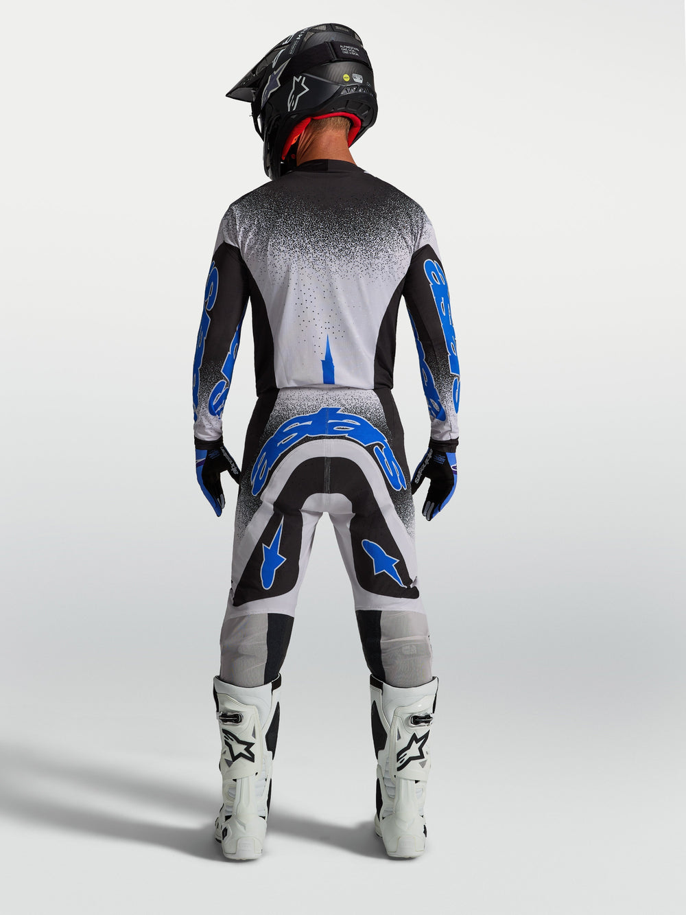 Alpinestars Supertech Hiten AFD Jersey and Gear Set, men's motocross outfit in black, white, and blue for performance.