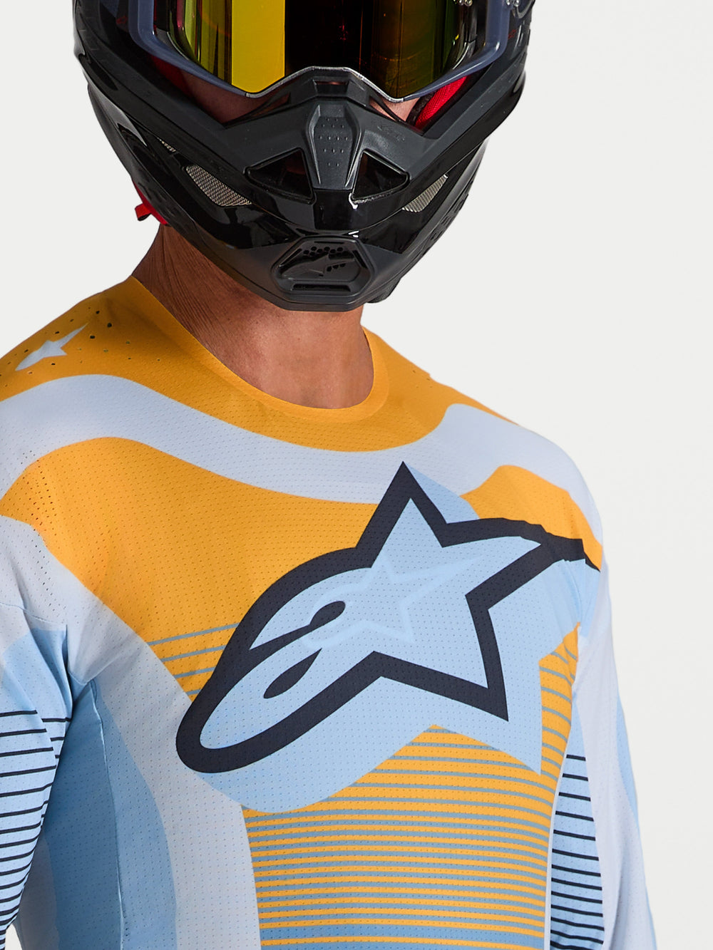 Alpinestars Techstar Maven Jersey, blue and tangerine motocross race top with laser-cut ventilation and athletic fit.