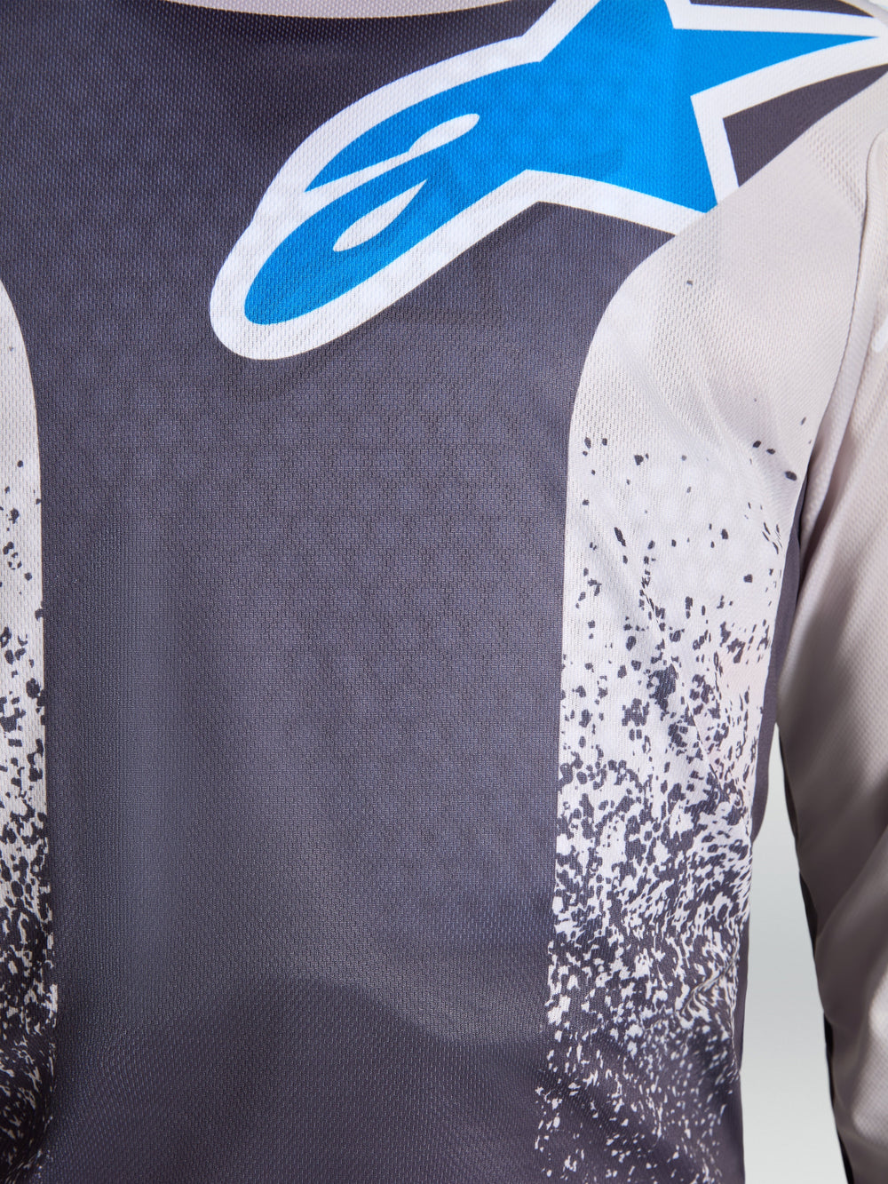 Alpinestars Fluid Drag Jersey, Men's Motocross Jersey, Graystone and UCLA Blue, close-up of breathable moisture-wicking polyfabric with signature star logo.