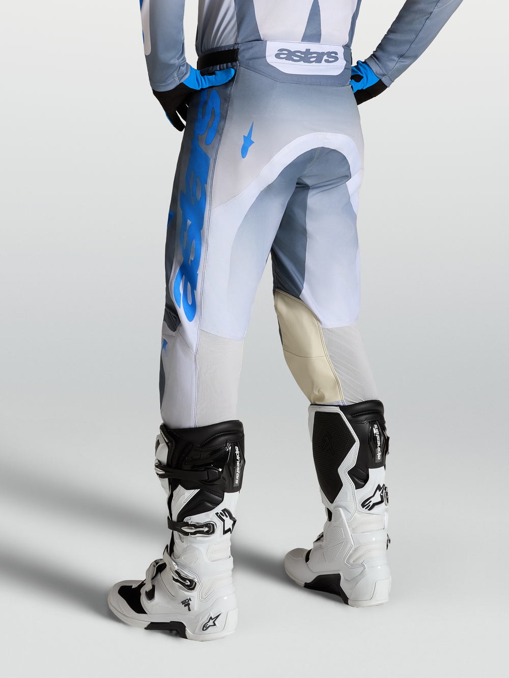 Alpinestars Racer Amber Pants, Men's Motocross Pants in Ash Gray and UCLA Blue, with leather knee panels and back ventilation.