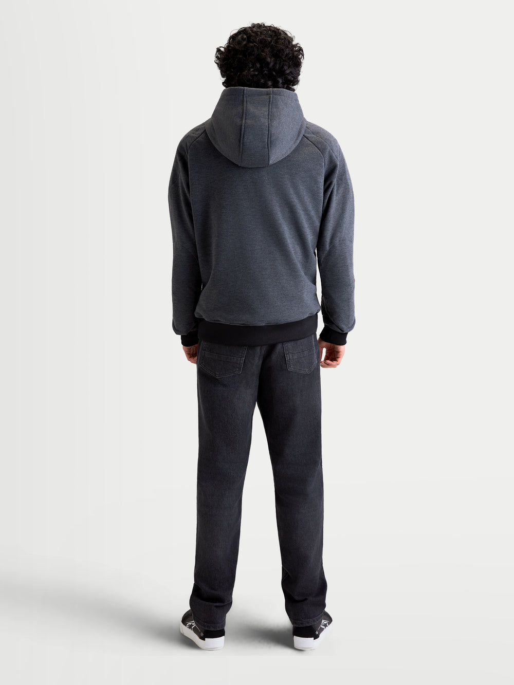 Alpinestars Ageless Hoodie, men's urban motorcycle hoodie jacket in asphalt melange gray, rear view showing a model wearing the textile riding hoodie with a fixed hood and reinforced back construction