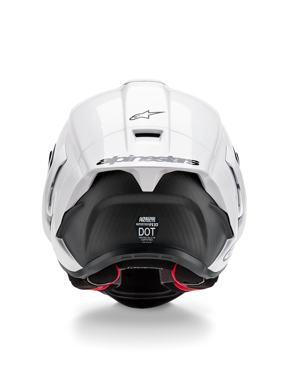 Alpinestars Supertech R10 Solid Helmet, Rear view, White Glossy top with Black Matte lower section, aerodynamic spoiler with black Alpinestars logo, visible carbon fiber texture, and safety certification decals