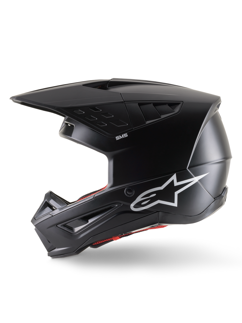 Alpinestars S-M5 Solid Helmet ECE 22.06, Motocross Helmet, Black Matt, side profile view featuring a sleek matte finish, white Alpinestars logo on the side, red interior padding, and aerodynamic shell with integrated ventilation ports