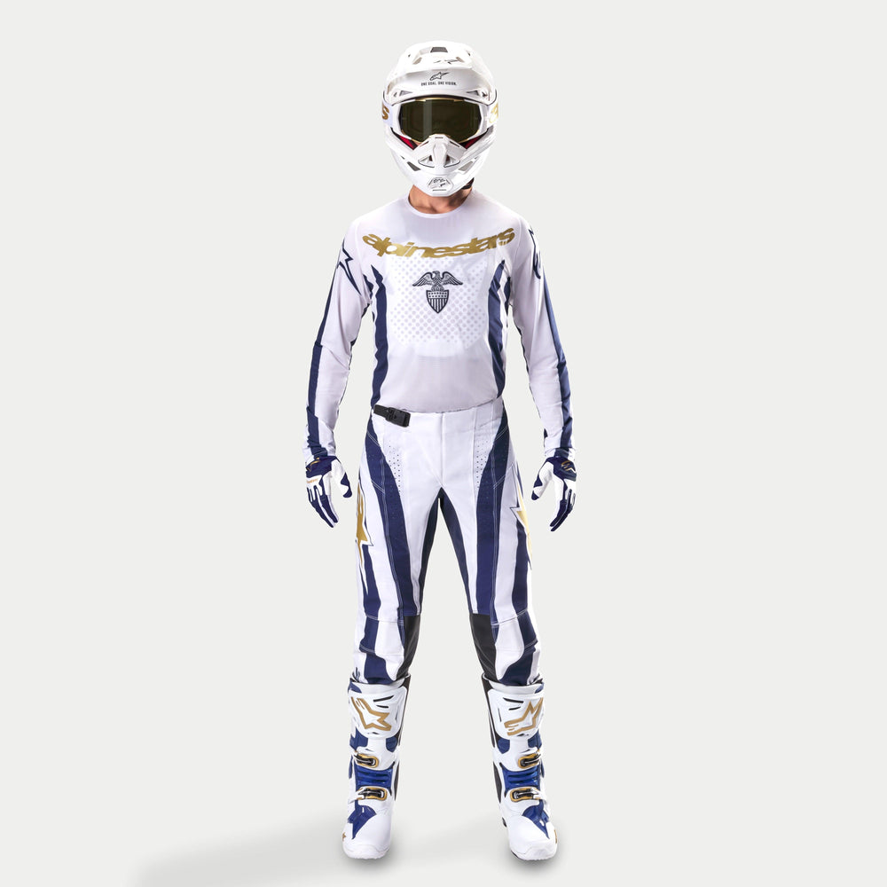 Alpinestars Techstar Dress Whites Tropical LE Jersey gear set, white and dark blue motocross racing outfit with gold accents.