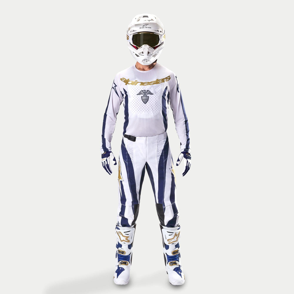 Alpinestars Techstar Dress Whites Tropical LE Pants, motocross racing outfit in white and dark blue with gold details.