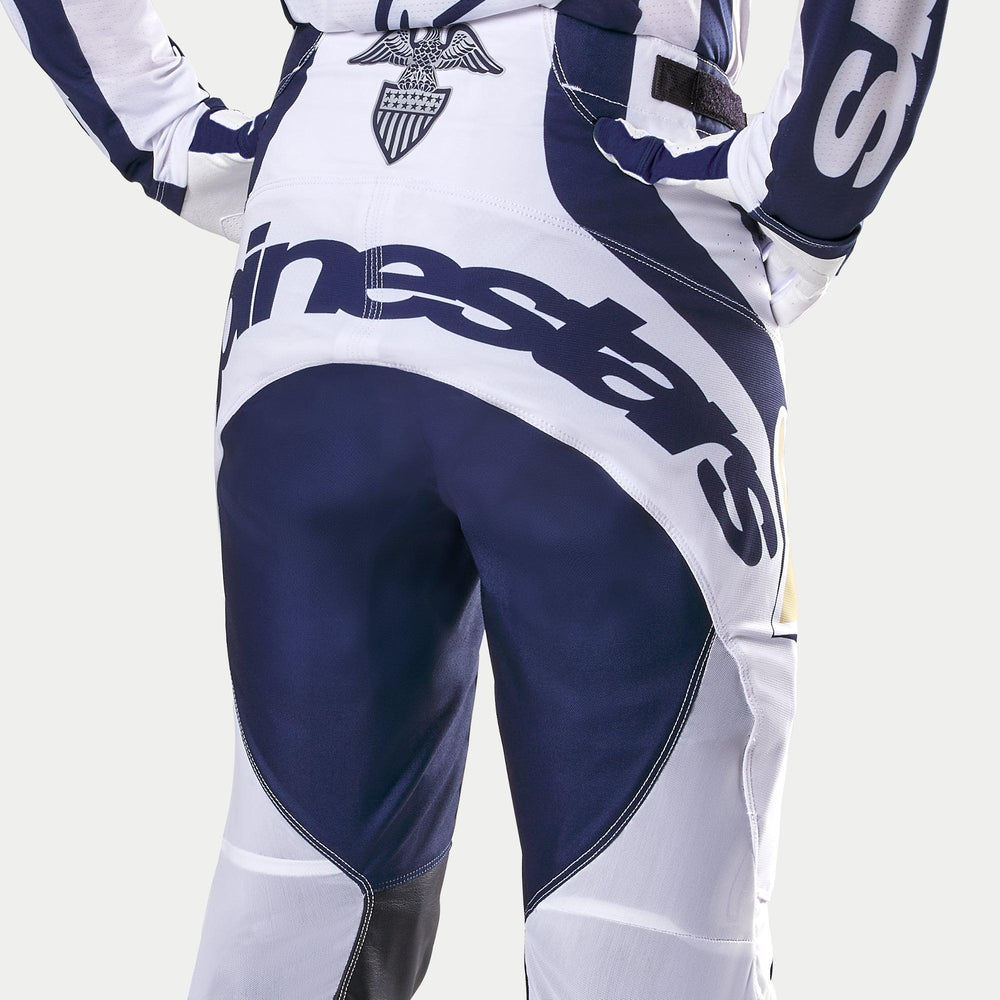 Alpinestars Techstar Dress Whites Tropical LE Men's Motocross Pants, rear detail in white and dark blue with gold accents.
