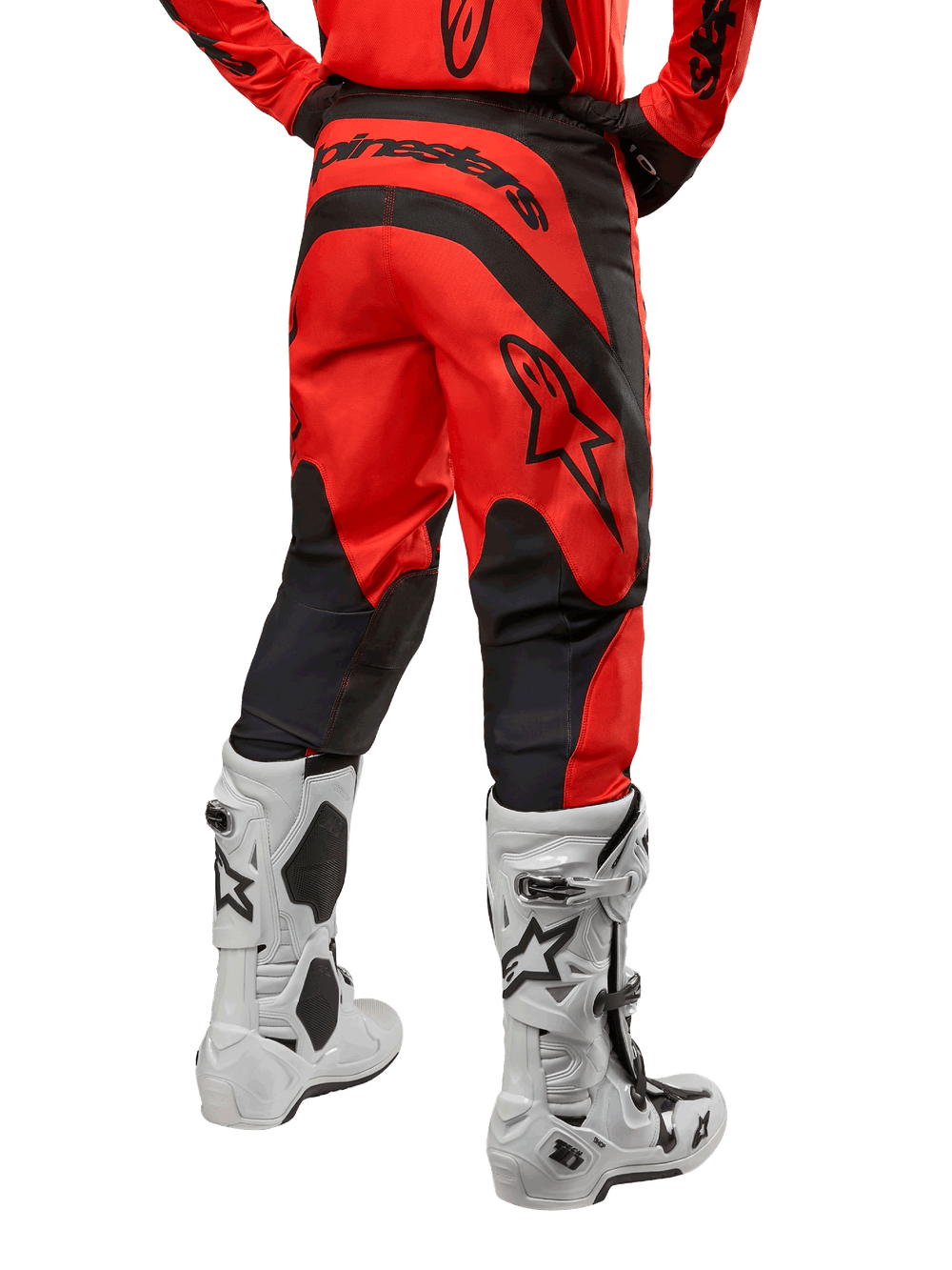 Alpinestars 2024 Fluid Lurv Pants, Hot Orange and Black motocross racing pants, back view with white Tech 10 boots.