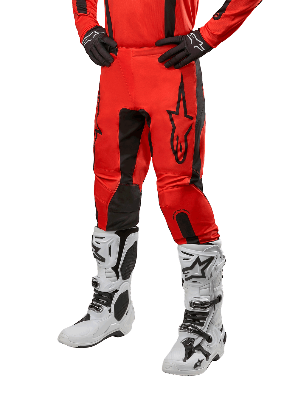 Alpinestars 2024 Fluid Lurv Motocross Pants in Hot Orange and Black, featuring a performance fit for off-road riding.