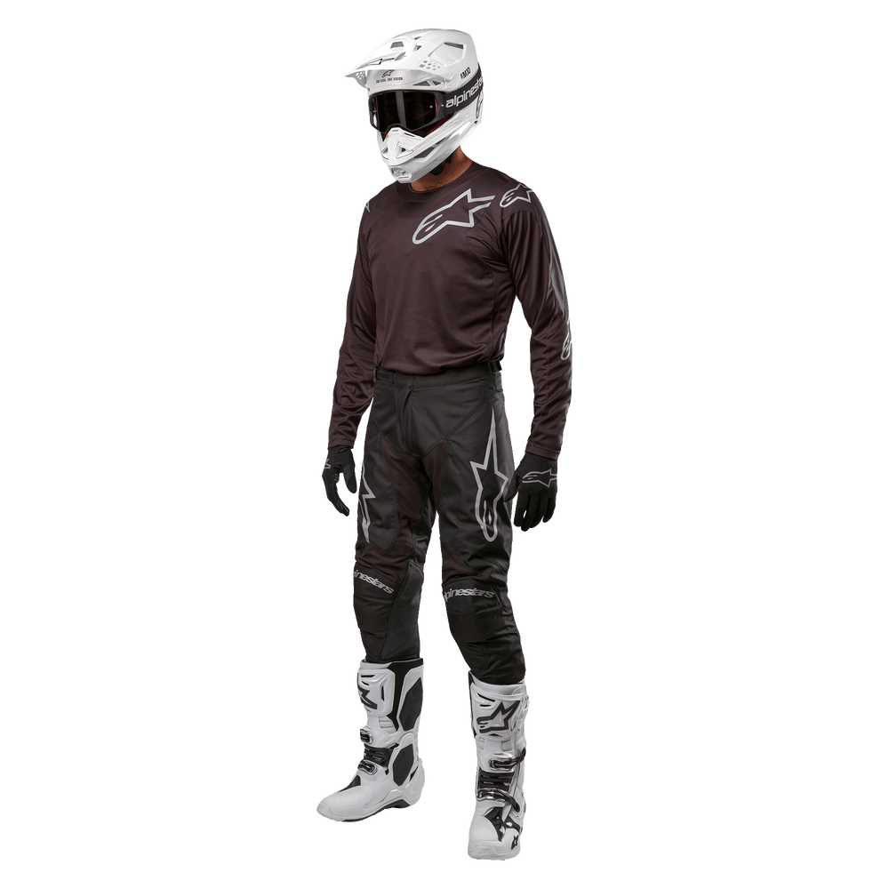 Alpinestars 2024 Racer Graphite Pants, black and white motocross gear set for men, featuring durable off-road protection.